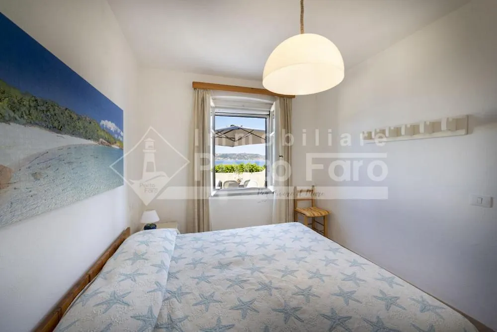 2 Pineta - Ampio Quadrilocale Sulla Spiaggia Di Porto Faro パラーウ